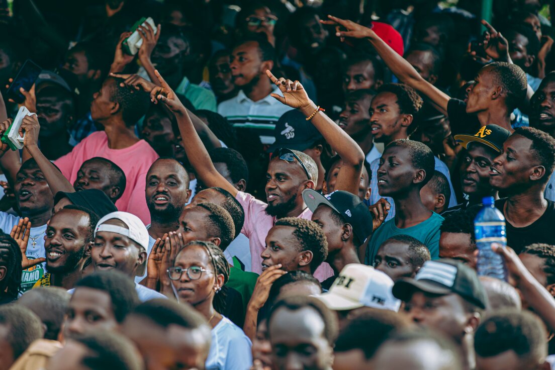 Supporters standing together at a community gathering